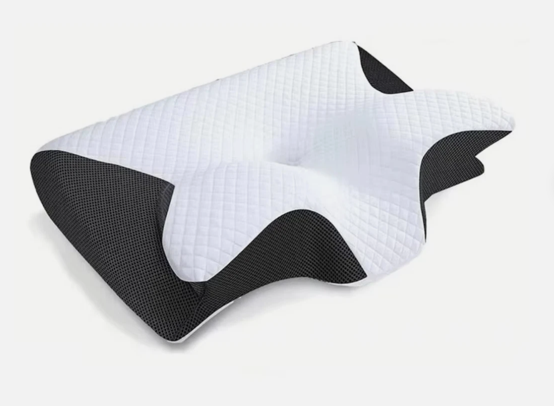 Ergonomic memory foam pillow in white and black contoured design